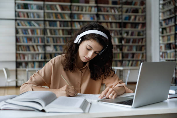 Student studying in a modern library
